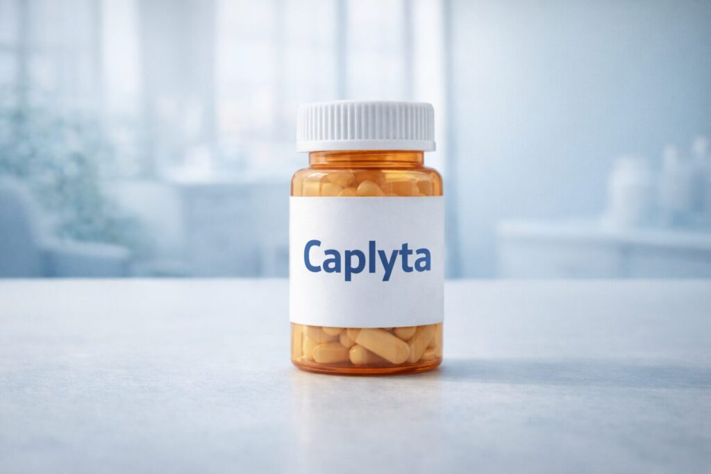 Caplyta prescription bottle representing an FDA approved medication for bipolar depression displayed in a modern medical office setting